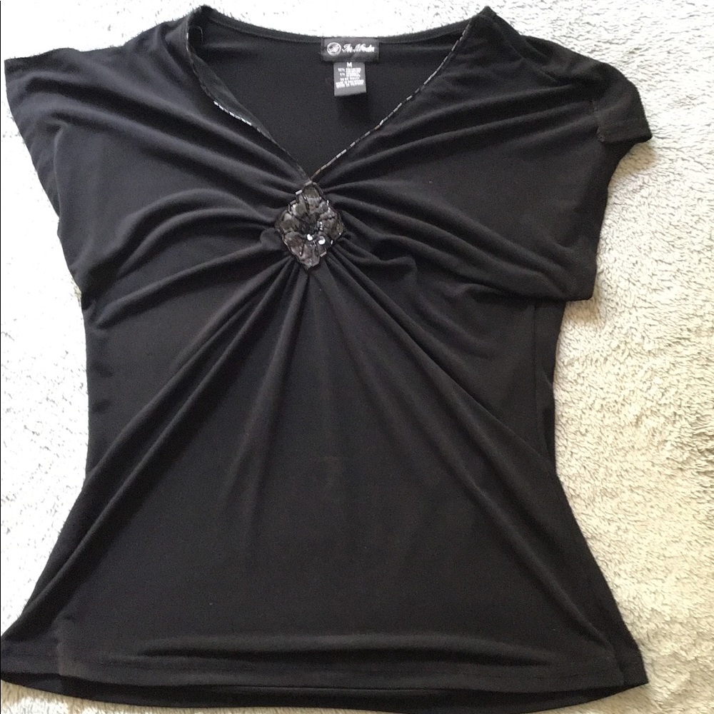 Beautiful beaded black blouse.